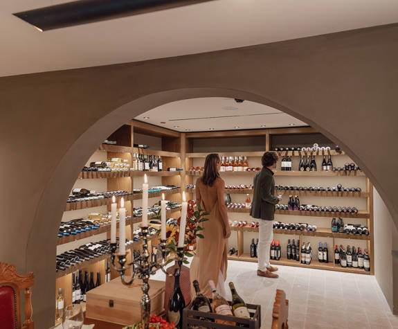 Minos Ambassador Wine Cellar Couple taking a look of the Wines 