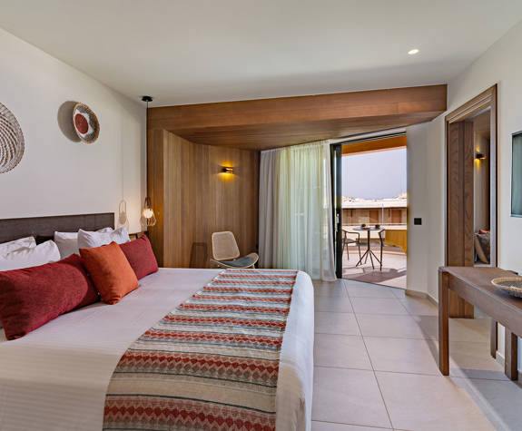 Minos Ambassador Suite King Bed Balcony View