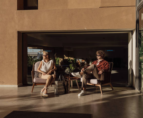 A Couple Relaxing in the Outdoor Area Of the Reception