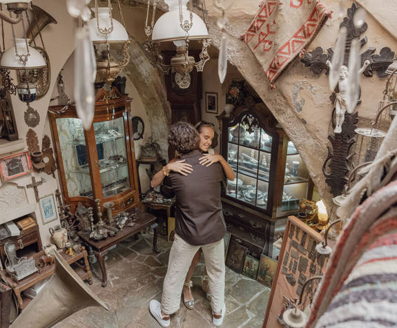 Couple Enjoying a Visit in an Antique Shop Downtown