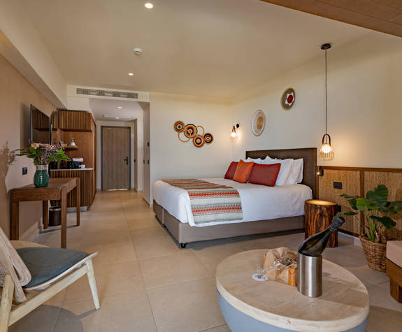 Minos Ambassador Junior Suite Full Bedroom Side View