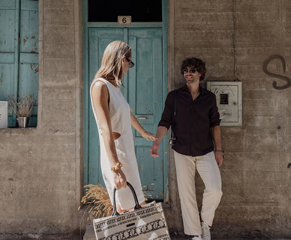 Couple Enjoying a Walk Downtown 