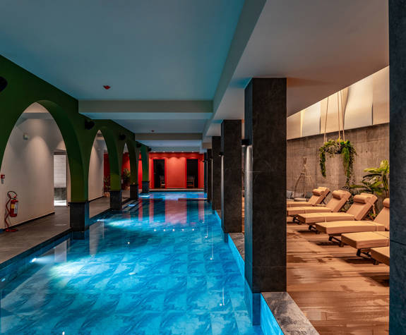 The Relaxation Area of the Spa Next to the Interior Pool