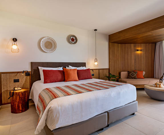 Minos Ambassador Deluxe Junior Suite Full Bedroom Front View