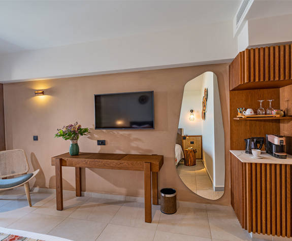 Minos Ambassador Deluxe Junior Suite Bedroom Amenities View