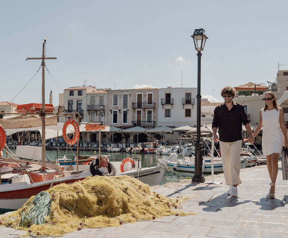 Couple Enjoying a Walk at the Port