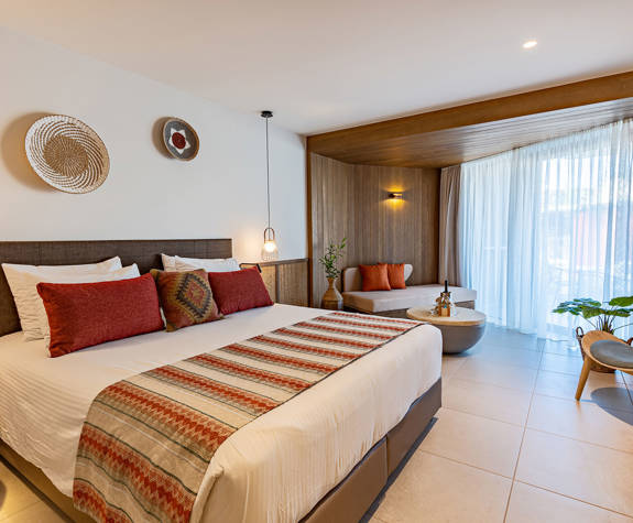 Minos Ambassador Junior Suite Full Bedroom View