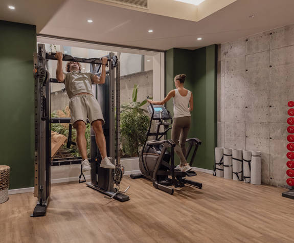 A Couple Training in the Gym