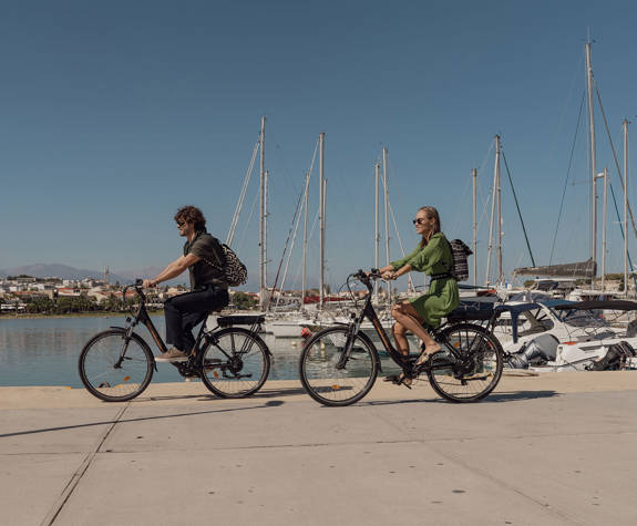 Couple Enjoying a Bike Ride at the Port