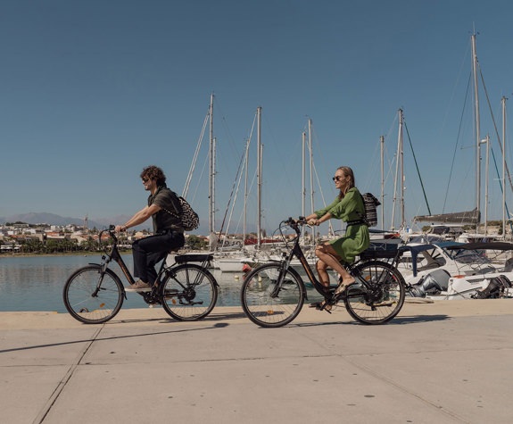 Couple Enjoying a Bike Ride at the Port