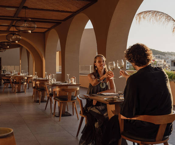Minos Ambassador Elia Restaurant Couple Making a Toast