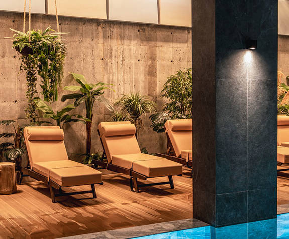 The Relaxation Area of the Spa Next to the Interior Pool