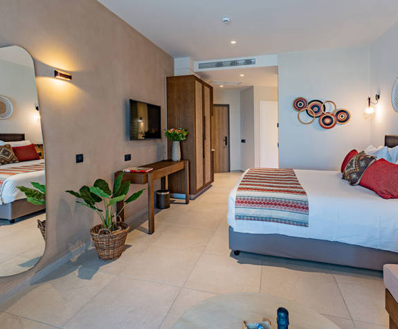 Minos Ambassador Superior Junior Suite Full Bedroom Side View