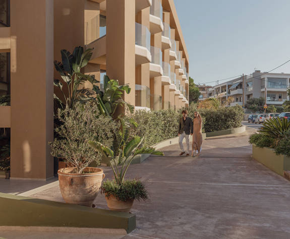 A Wide View of A Couple Heading to the Entrance of the Reception