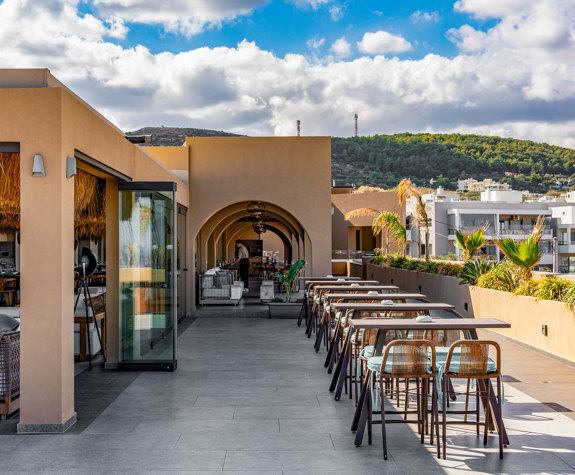 Minos Ambassador Pool Bar Restaurant Balcony Tables Front View